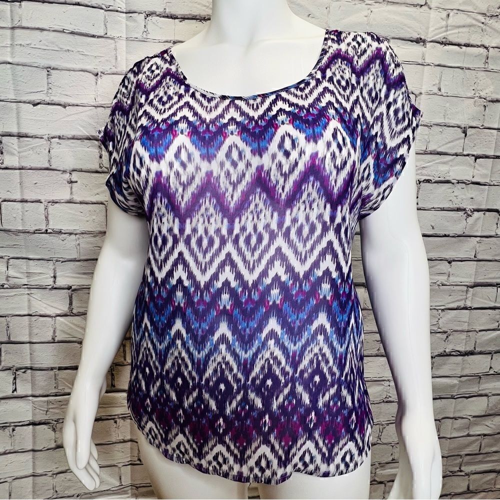 Torrid purple geo print bow back sheer blouse.